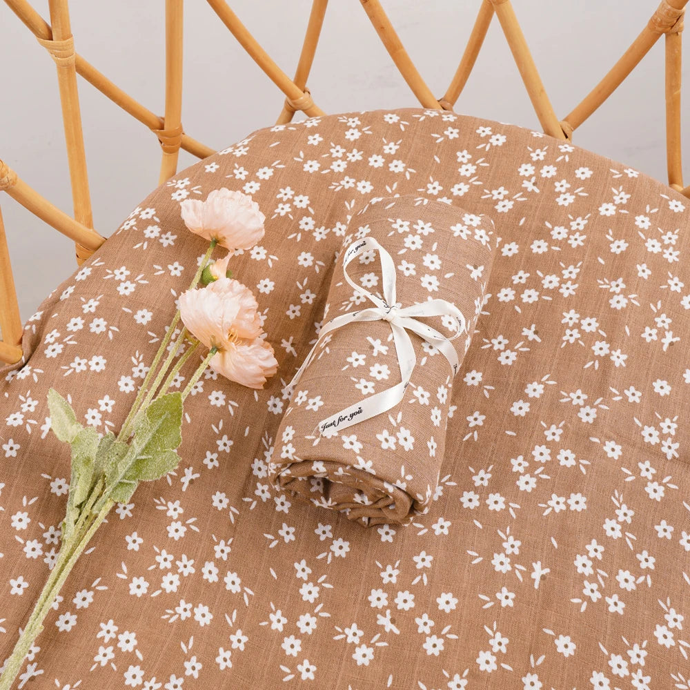Nest & Hold™ Muslin Baby Swaddle