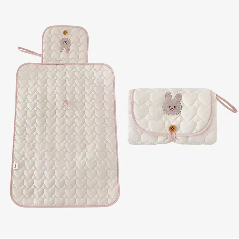 Nest & Hold™ Foldable Changing Pad