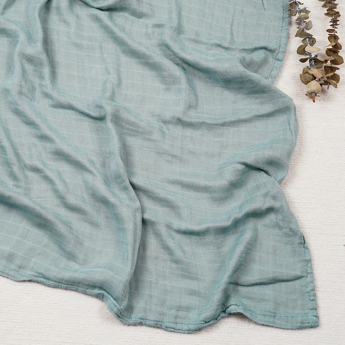 Nest & Hold™ Muslin Baby Swaddle