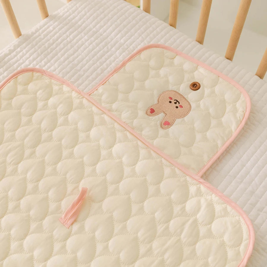 Nest & Hold™ Foldable Changing Pad