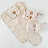 Nest & Hold™ Foldable Changing Pad