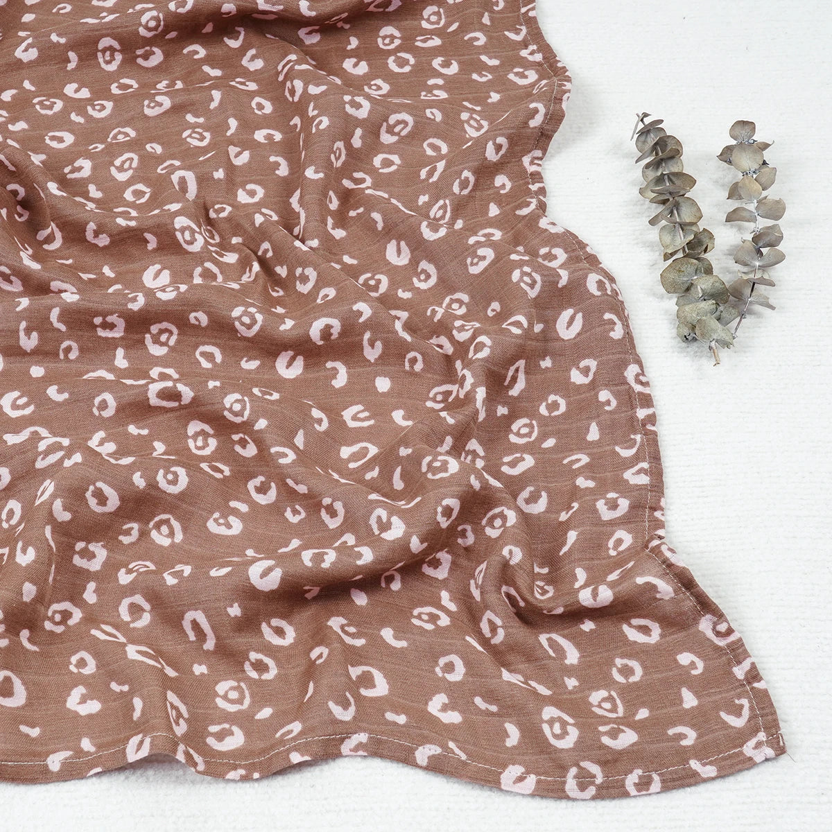 Nest & Hold™ Muslin Baby Swaddle